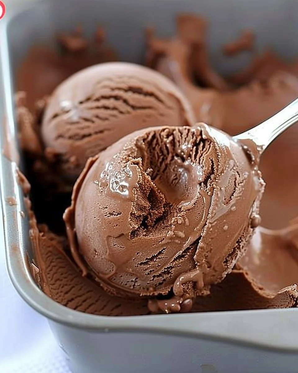 Homemade chocolate ice cream made with 3 simple ingredients in an ice cream maker.