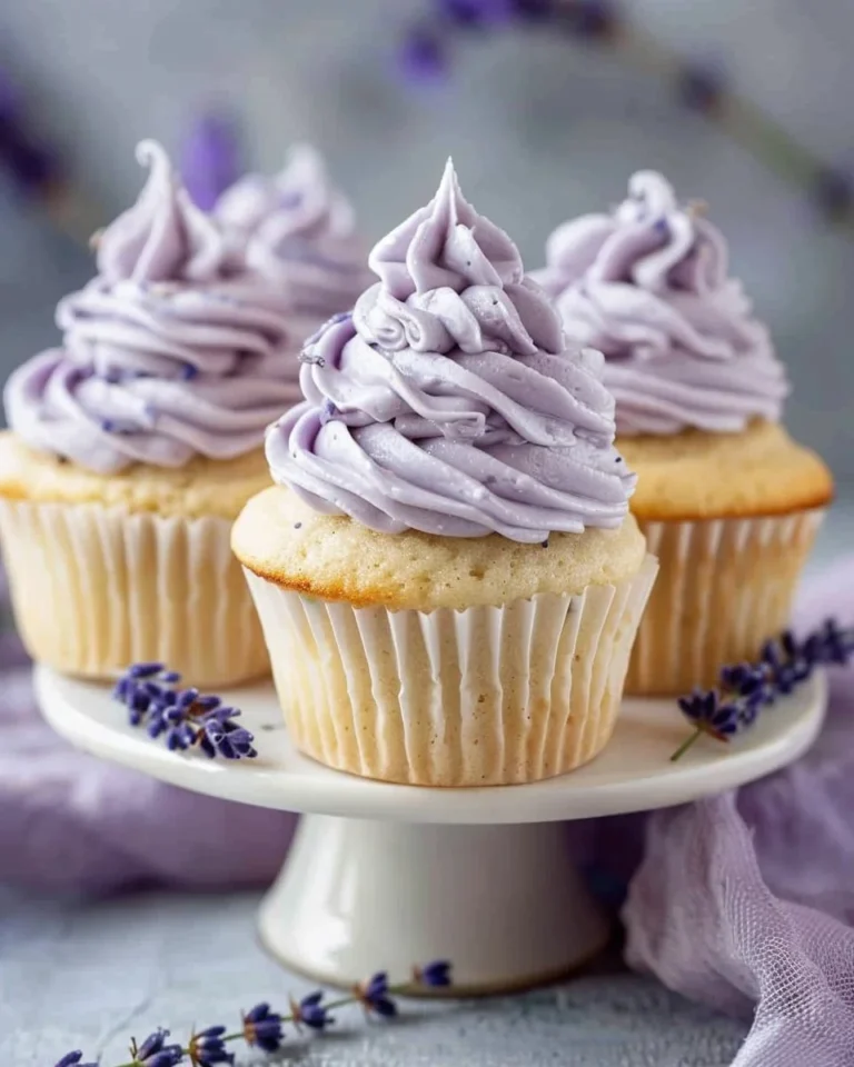 Vegan lavender buttercream frosting spread on a cake