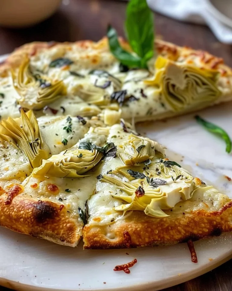 Delicious artichoke pizza topped with fresh ingredients and cheese