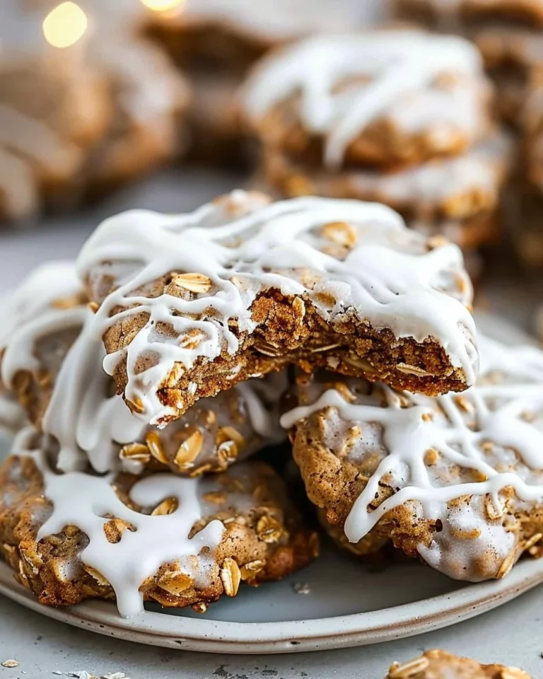 Delicious gingerbread oatmeal cookies with icing decorated on a festive plate.