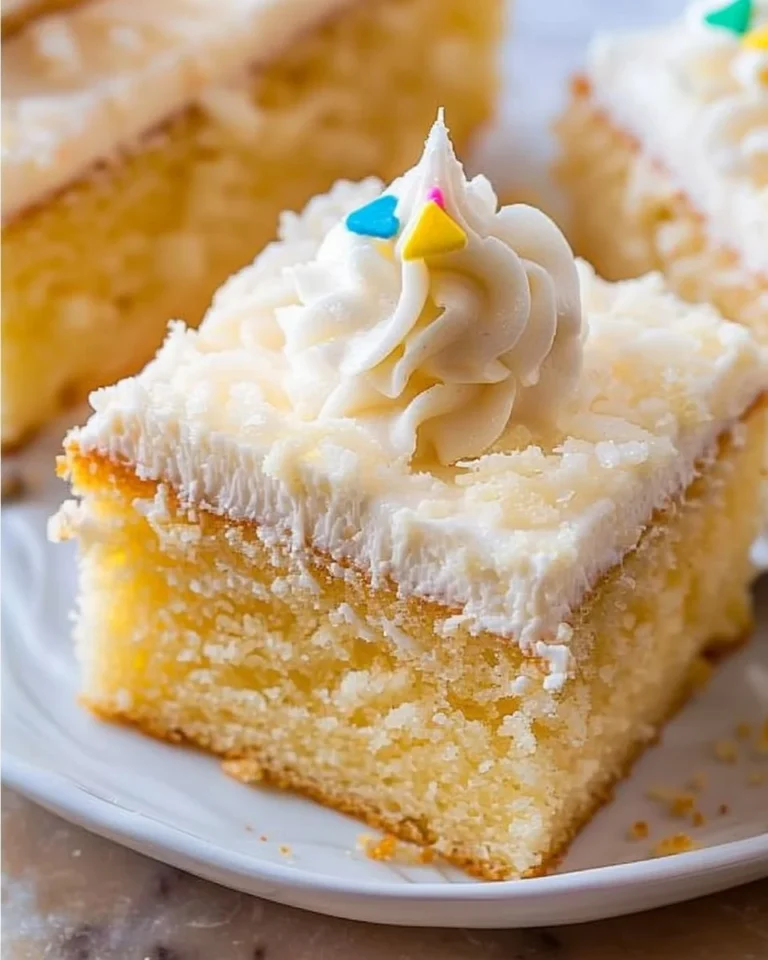 Delicious homemade vanilla sheet cake with frosting ready to serve